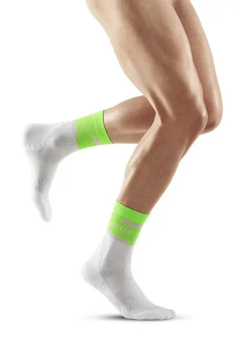 cep-the-run-socks-mid-cut-v4-green-white-wp3cwr-front-model-web_1_800x.jpg